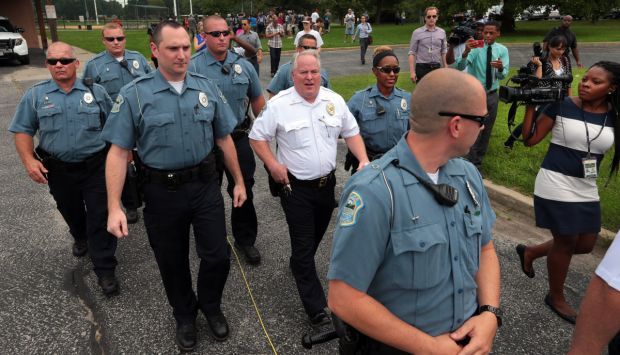 Ferguson police chief answers questions under heightened security